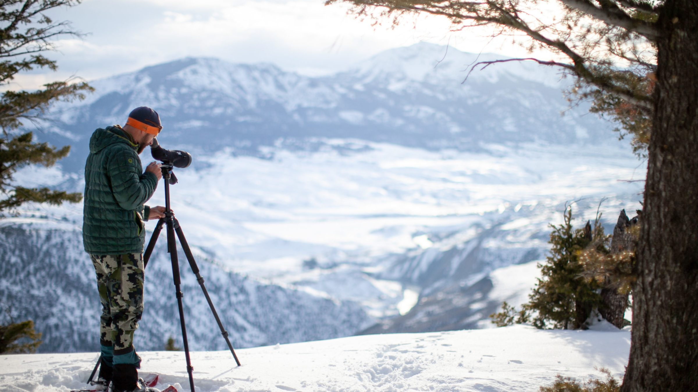 a man is cross country skiing in the snow