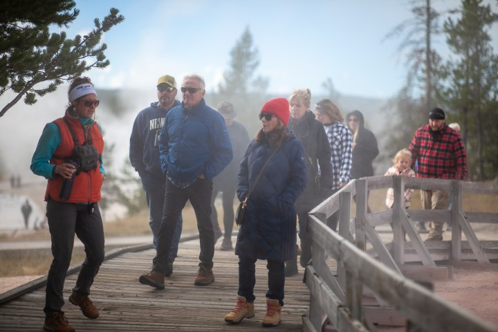 a group of people that are standing in the snow
