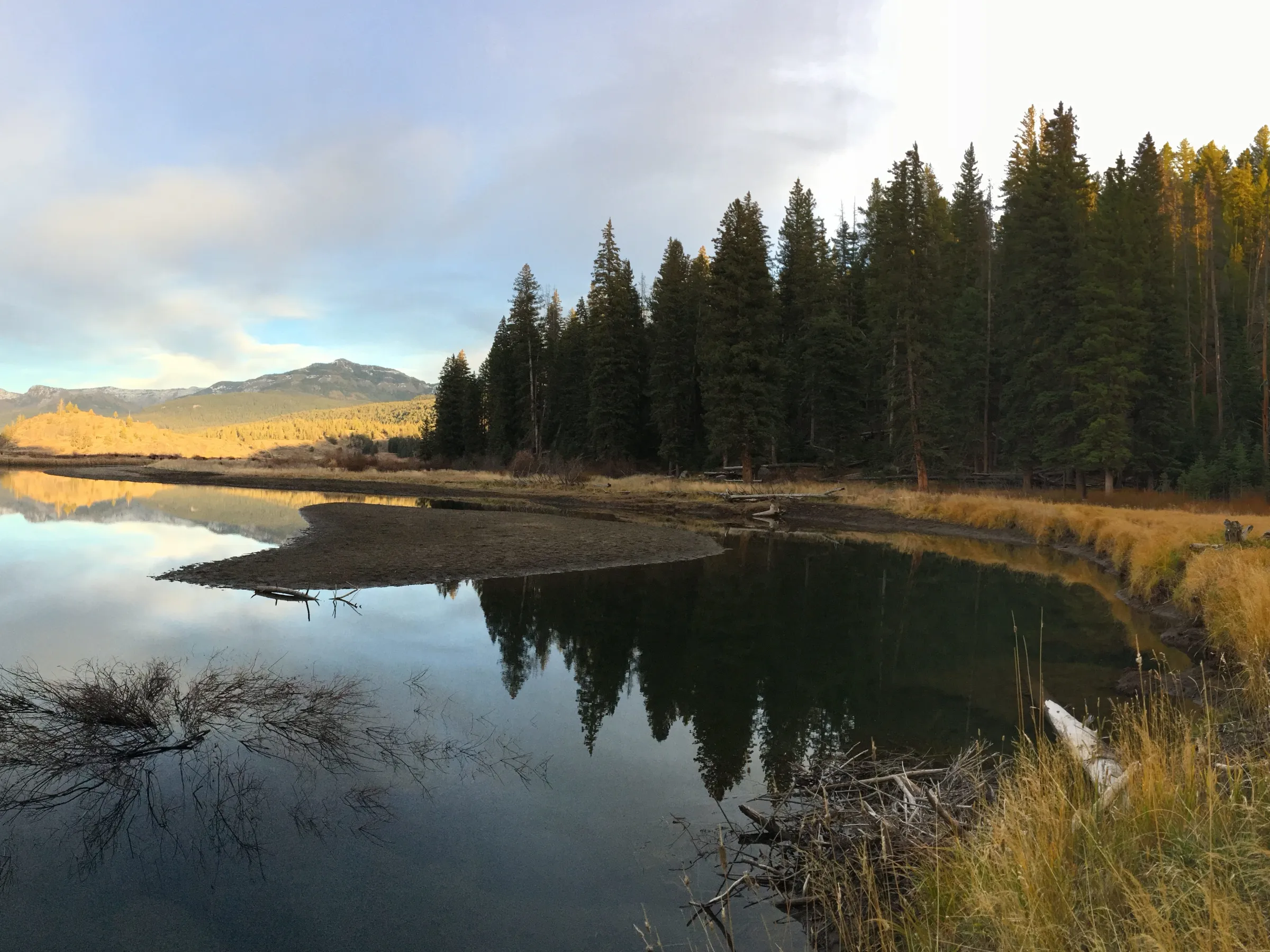 backpackers near a lake