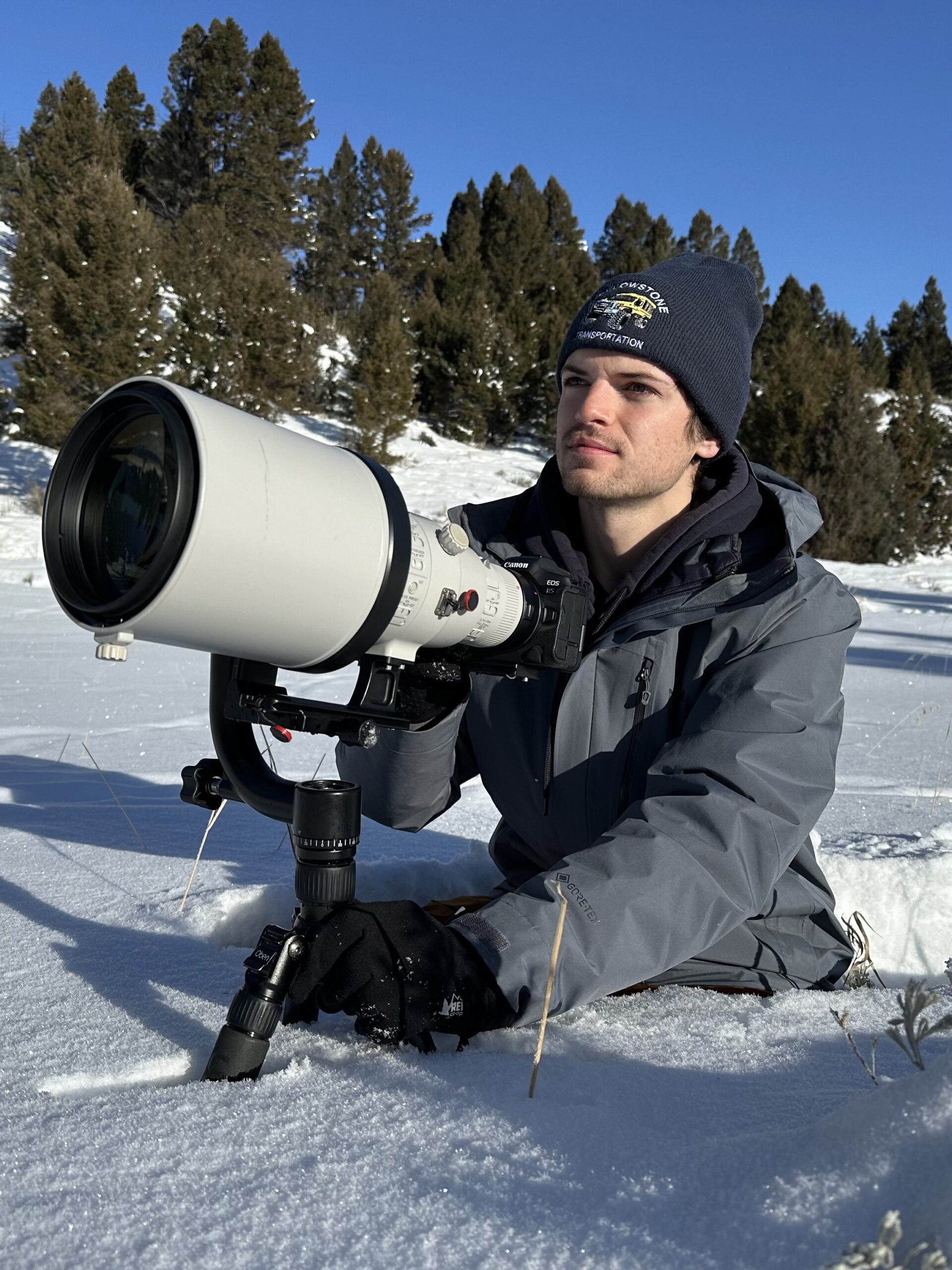a man that is standing in the snow