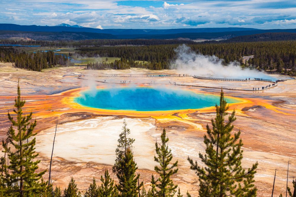 Grand Prismatic Hot Spring is vibrant and visible as air temperatures rise in spring and summer.