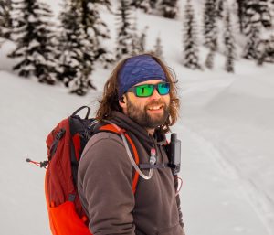 Yellowstone Wild Guide Isaac Rath takes visitors on wildlife, geology, and photo tours in Yellowstone.