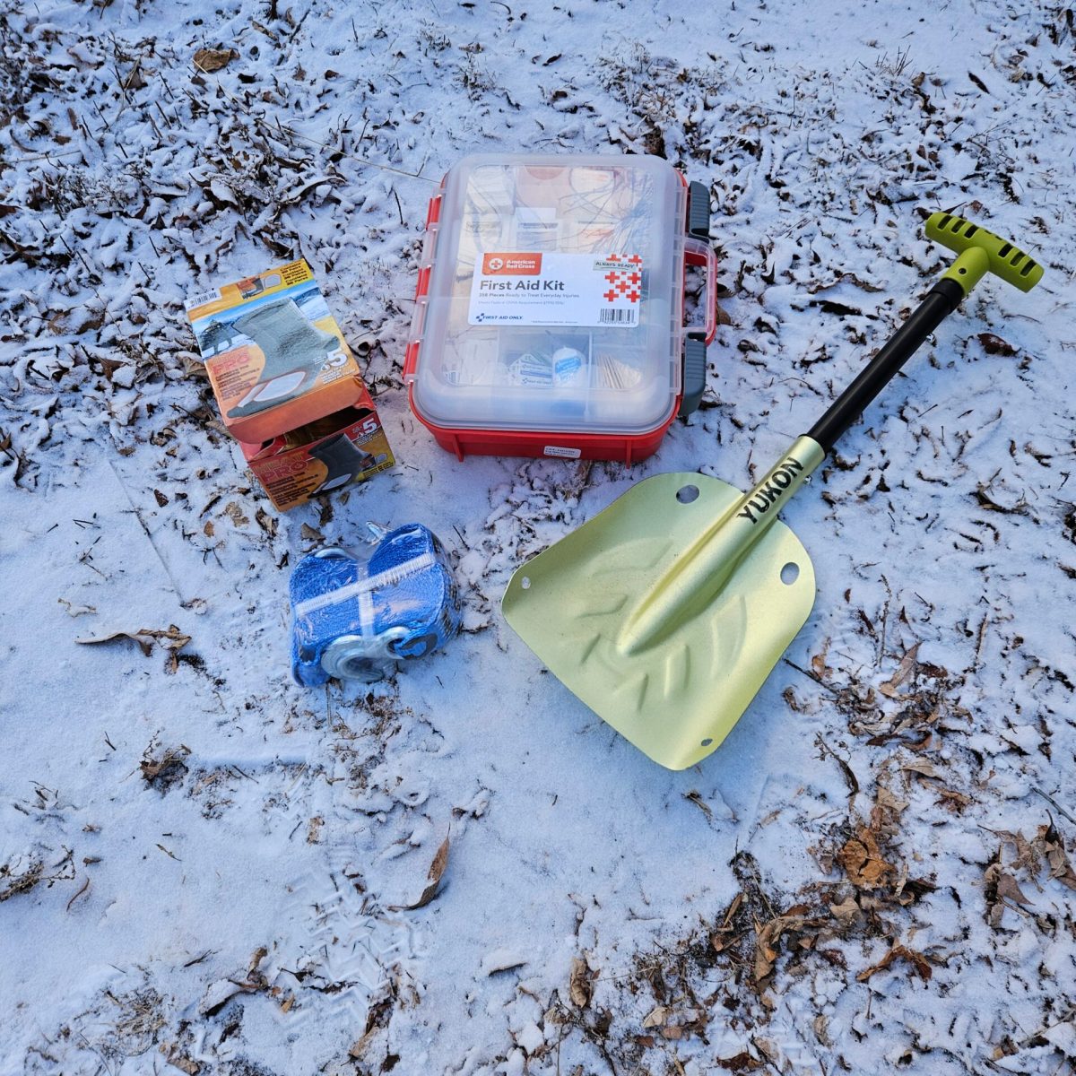 Snow shovels, first-aid kits, tow straps, and foot warmers are located in all Yellowstone Wild tour vehicles for safety and comfort while guests are on winter tours in Yellowstone National Park.