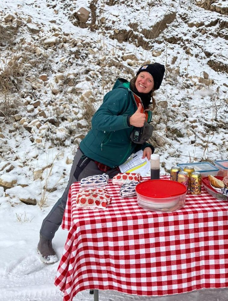 Guests enjoy lunch while on a winter tour with Yellowstone Wild in Yellowstone National Park.