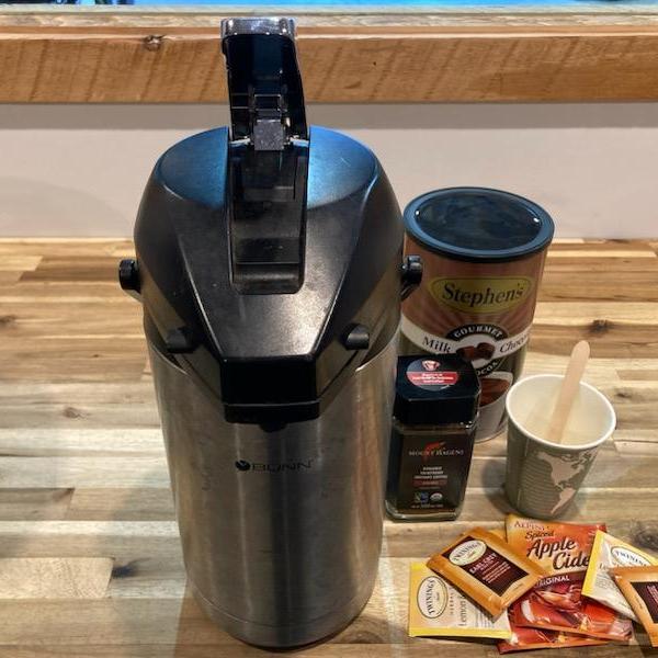 Hot and cold beverages are made available to winter guests on tour with Yellowstone Wild Tours in Yellowstone National Park.