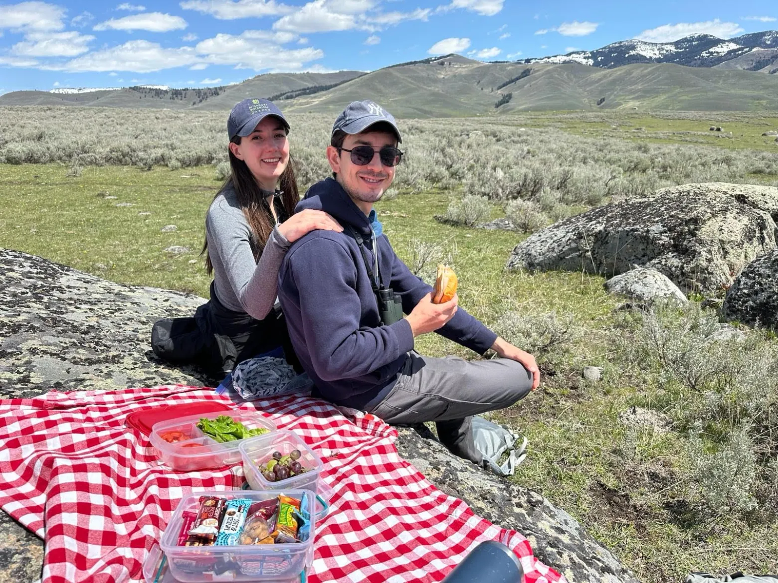 a man sitting on a rock
