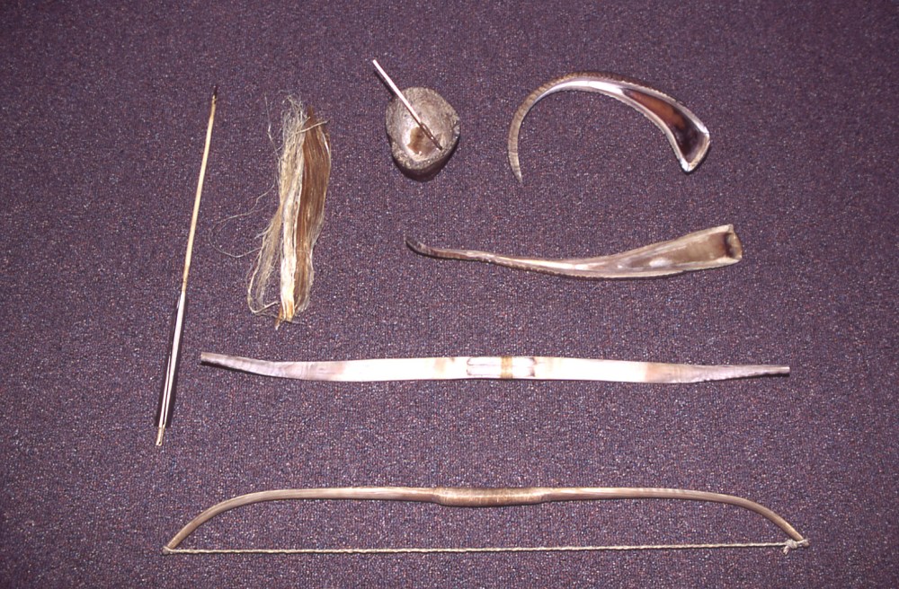 Sheepeater bow making materials acquired from big horn sheep ram horns. The horns were made pliable by soaking them in area hot springs. Photo courtesy of Jim Peaco, NPS photo library.